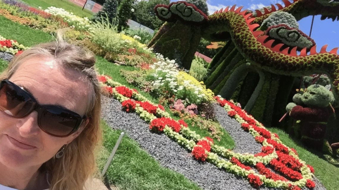 woman standing in front of a garden sculpture in Gatineau Quebec