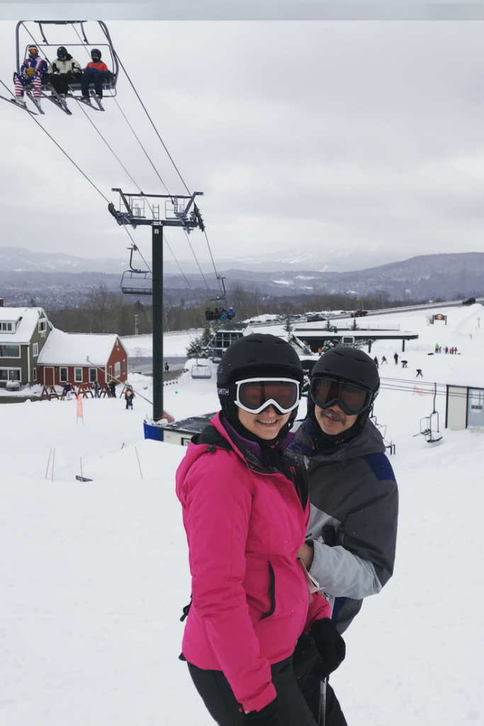 vermont_skiing_husband_and_wife_posing_in_gear_at_bromley_mountain_vermont