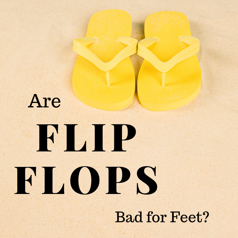 yellow flip flops in the sand