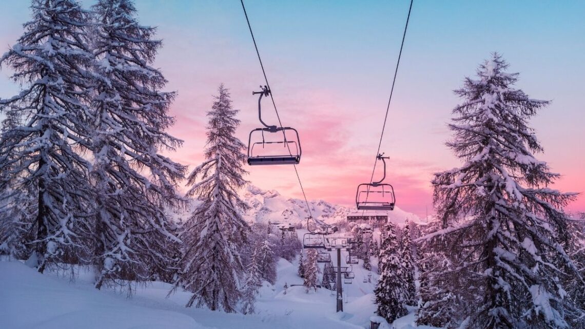 ski_in_ski_out_resorts_chairlift_pink_sky_snow