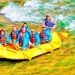 8 people in a yellow raft white water rafting in Cody Wyoming down the Shoshone River. All are wearing some blue wet jacket gear and life jackets