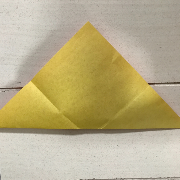 yellow_paper_folded_in_triangles
