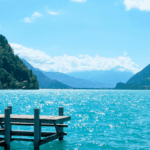 summer at the lake. blue lake and mountains in the background