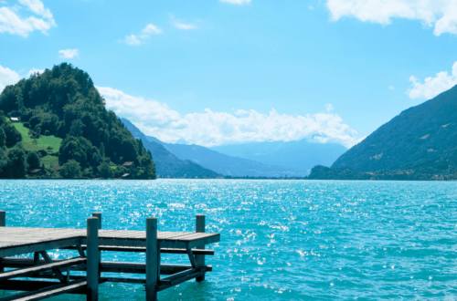 summer at the lake. blue lake and mountains in the background